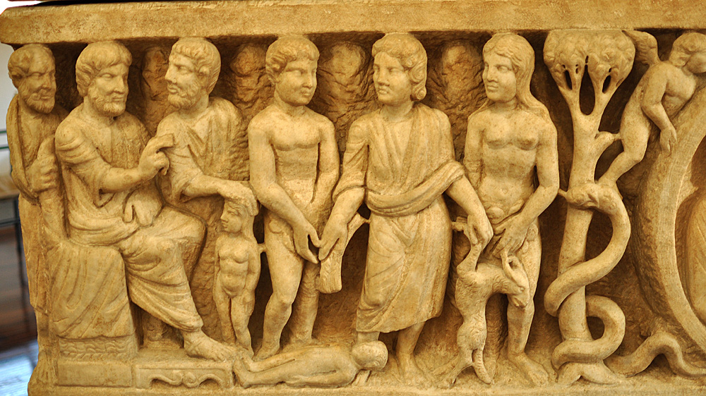 Upper register, far left of the Dogmatic Sarcophagus (before mid-4th cent.): The Trinity, Creation of Eve, Labors Assigned to Adam and Eve